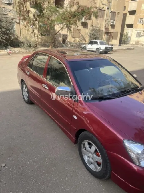 Mitsubishi Lancer Puma 2009 Red Automatic Used for Sale in Mansoura - 2