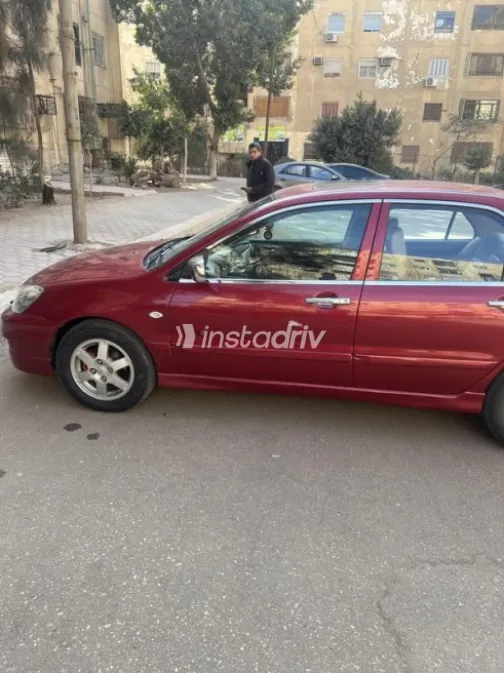 Mitsubishi Lancer Puma 2009 Red Automatic Used for Sale in Mansoura - 3
