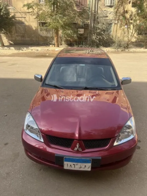 Mitsubishi Lancer Puma 2009 Red Automatic Used for Sale in Mansoura - 4