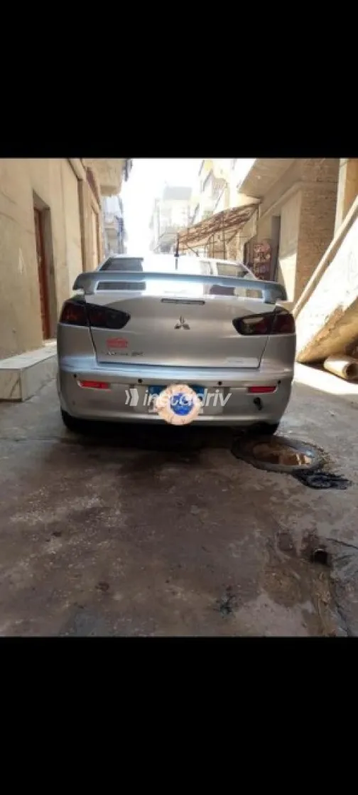 Mitsubishi Lancer 2014 Silver Automatic Used for Sale in Mansoura - 4
