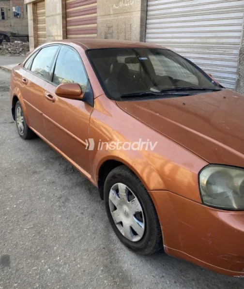 Chevrolet Optra 2005 Orange Automatic Used for Sale in Mansoura - 2