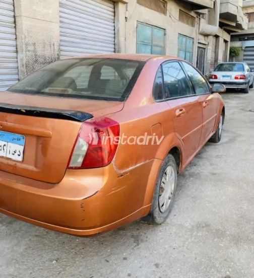 Chevrolet Optra 2005 Orange Automatic Used for Sale in Mansoura - 3