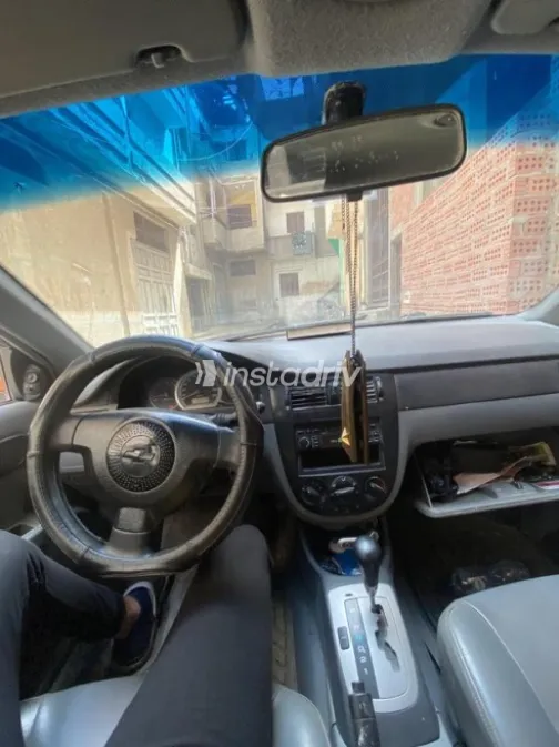 Chevrolet Optra 2005 Orange Automatic Used for Sale in Mansoura - 6