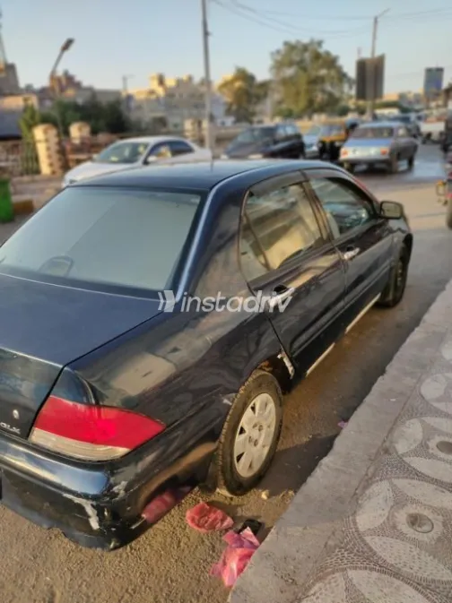 Mitsubishi Lancer 2001 Dark Blue Manual Used for Sale in Mokattam - 10