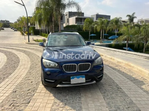 BMW X1 2014 Dark Blue Automatic Used for Sale in Sheikh Zayed City - 2
