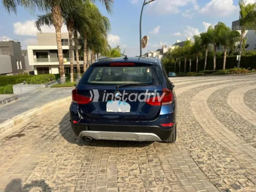 BMW X1 2014 Dark Blue Automatic Used for Sale in Sheikh Zayed City - 4