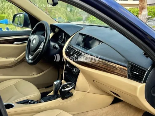 BMW X1 2014 Dark Blue Automatic Used for Sale in Sheikh Zayed City - 7