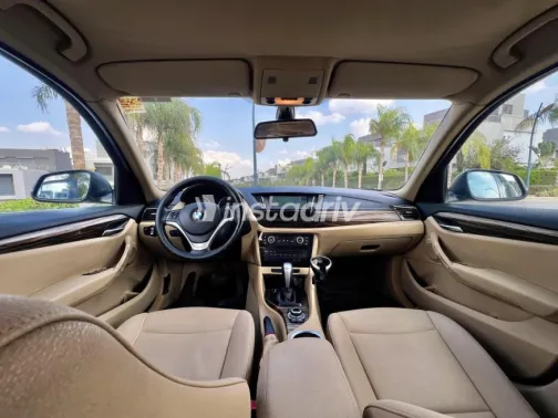 BMW X1 2014 Dark Blue Automatic Used for Sale in Sheikh Zayed City - 9