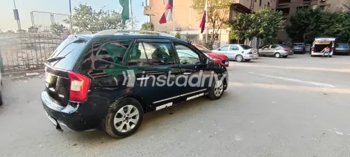 Kia Carens 2012 Black Automatic Used for Sale in Greater Cairo ( Cairo + Giza) - 2