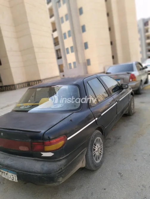 Kia Sephia 1996 White Manual Used for Sale in Greater Cairo ( Cairo + Giza) - 8