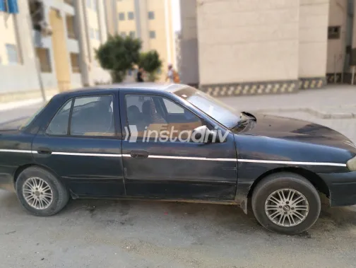 Kia Sephia 1996 White Manual Used for Sale in Greater Cairo ( Cairo + Giza) - 9